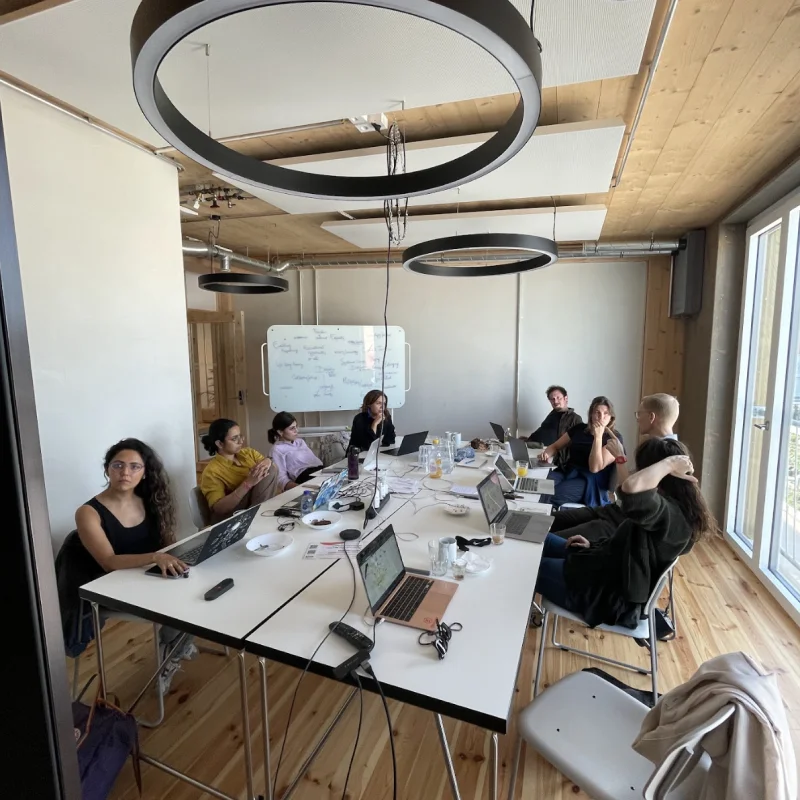 Team members from Kiron Digital in a brainstorming situation