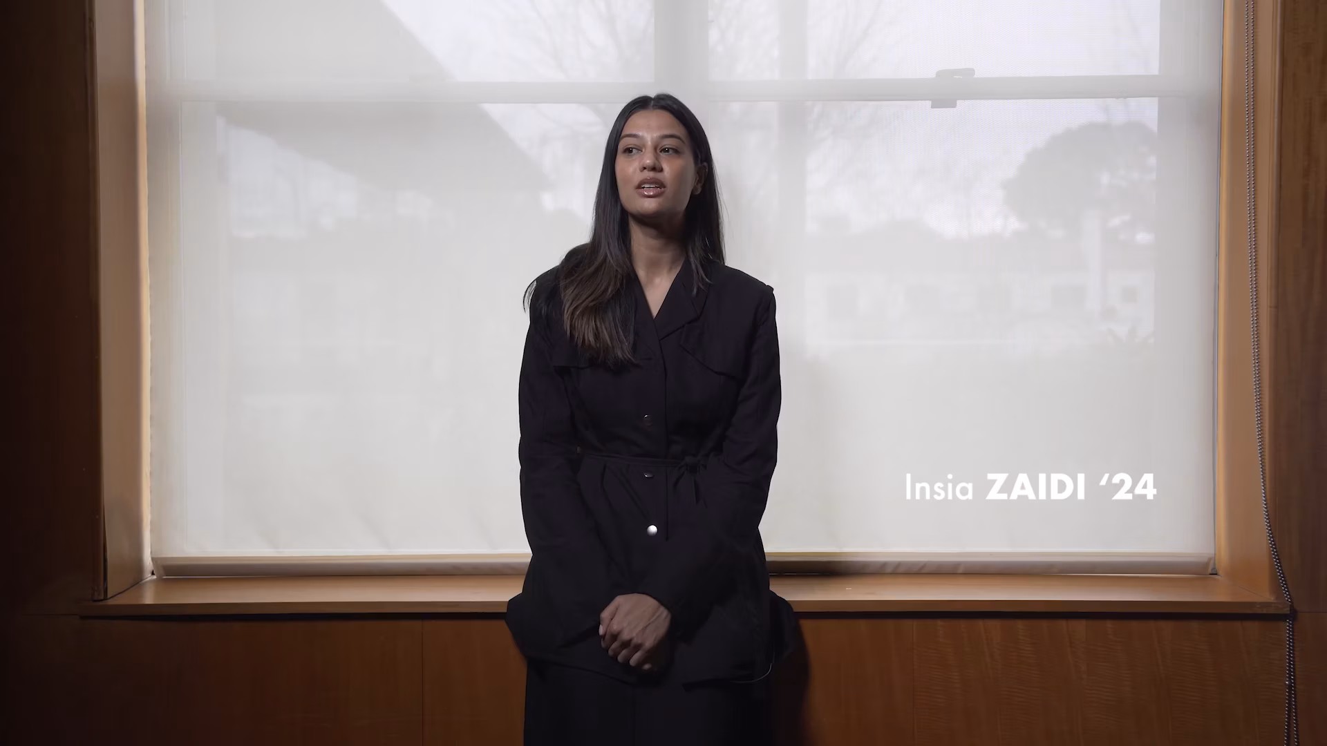 Insia Zaidi standing